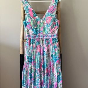 Lily Pulitzer dress with sewn in pads, pockets and open back.No stains or rips